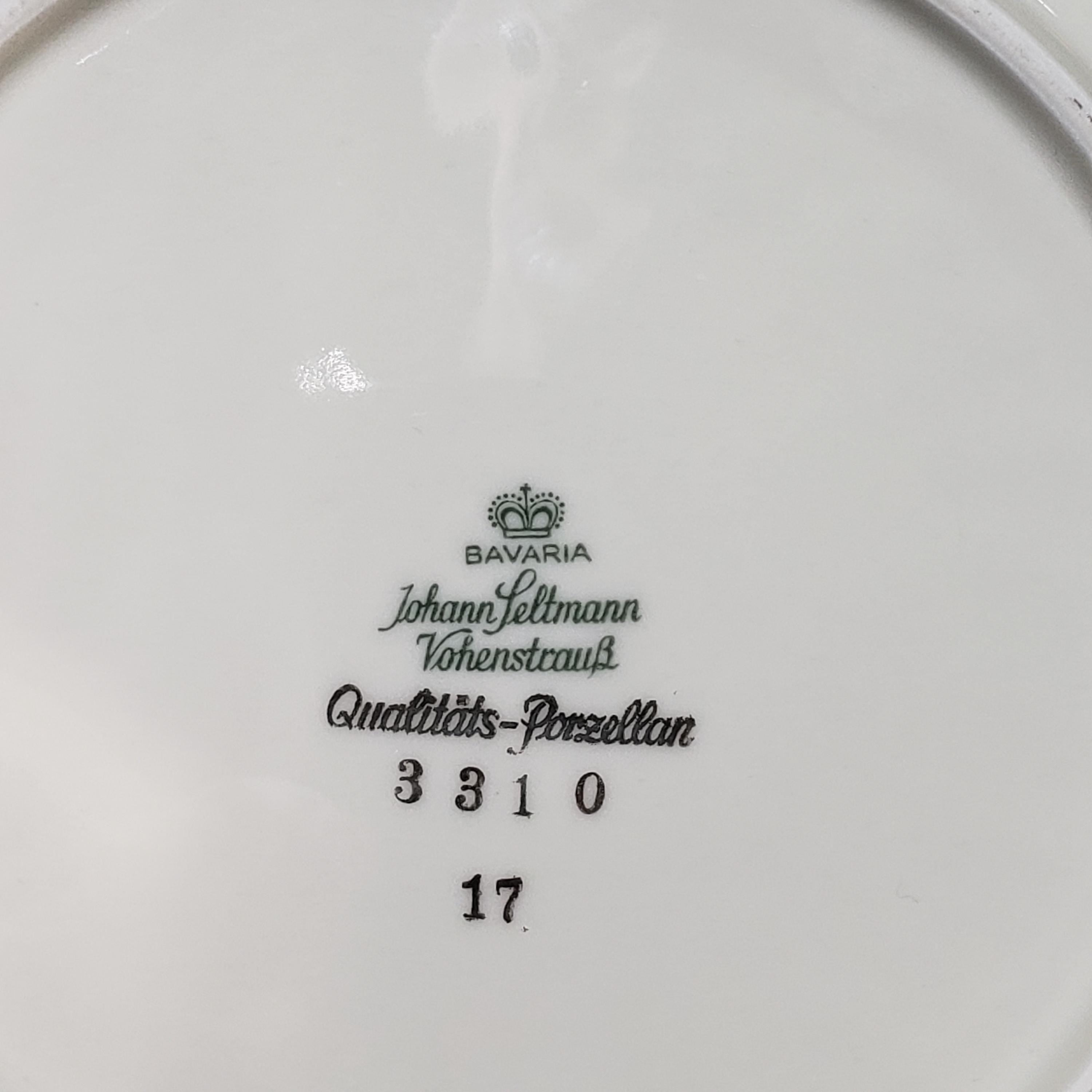 a close-up view of a white porcelain plate with text and numbers printed on it.