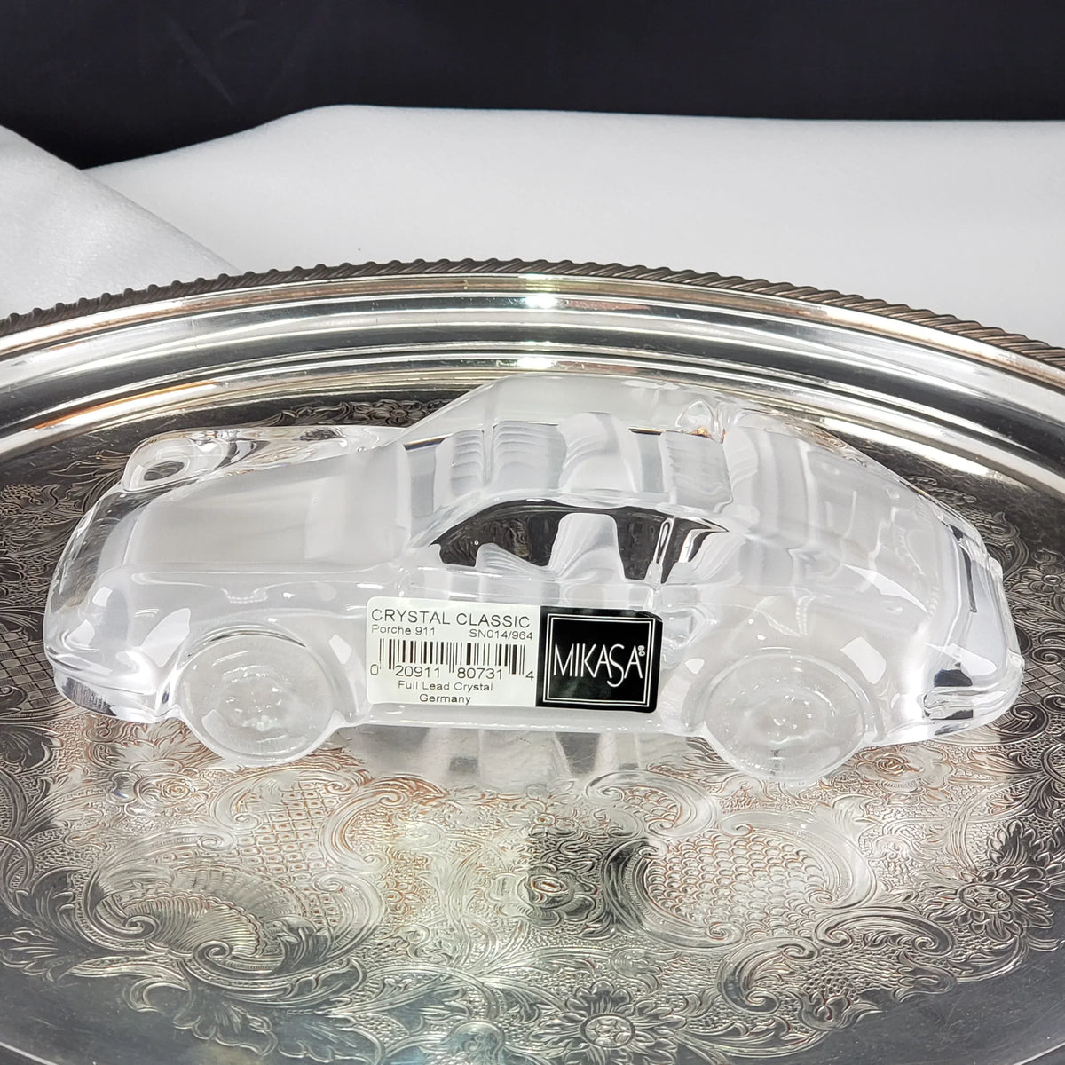 Mikasa Crystal Classic Porsche 911 collectible car figurine on a silver tray.
