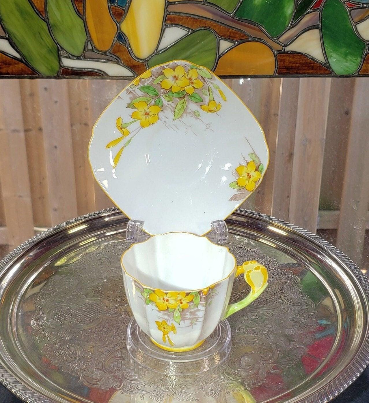 Royal Paragon Teacup and Saucer: English China (Yellow Daffodil Design)