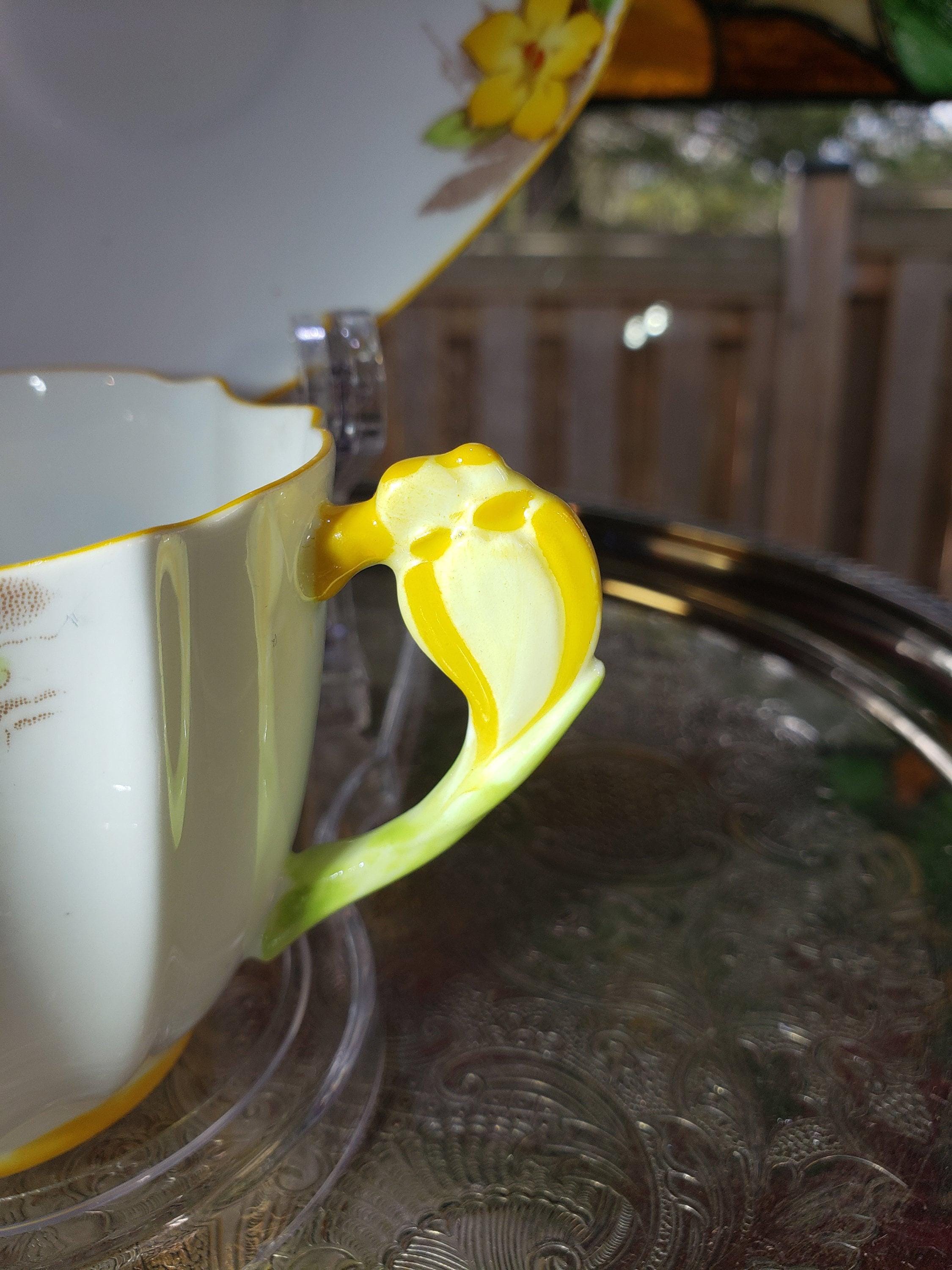 Royal Paragon Teacup and Saucer: English China (Yellow Daffodil Design)